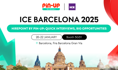 PIN-UP Global HirePoint at ICE Conference 2024 Stand 5G31 - Recruitment Team Conducting Interviews and Showcasing Career Opportunities in iGaming.